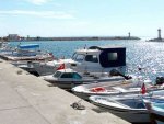 Quai SE, en face les passes, un peu plus dans le sud, masqué, l'emplacement des bateaux de passage {JPEG}